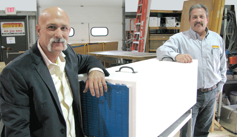 Houle Construction President Tim Pelletier, left, and Vice President Bob Langevin