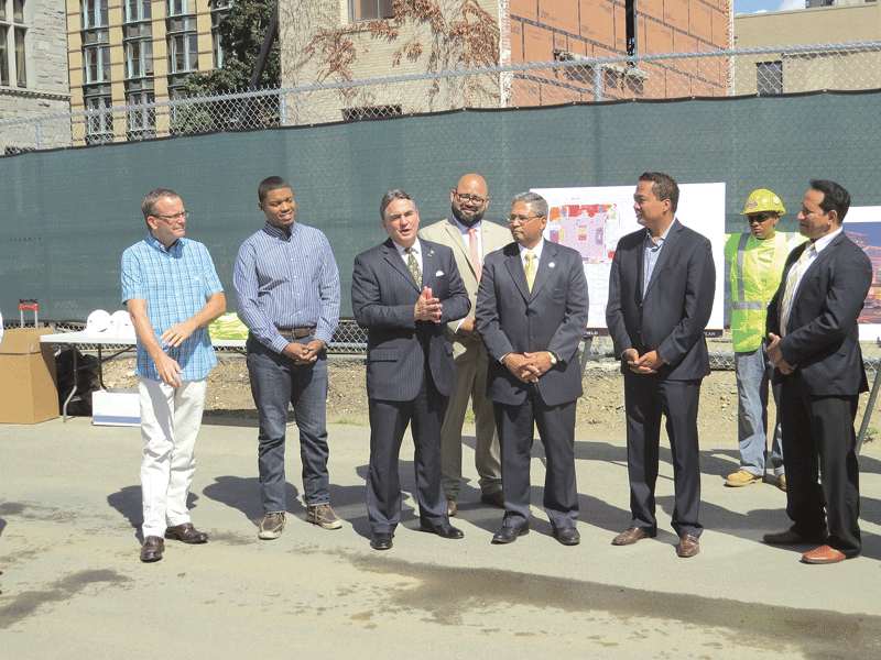 Springfield mayor Domenic Sarno offers remarks at the start of the tour of MGM’s construction site in the South End.