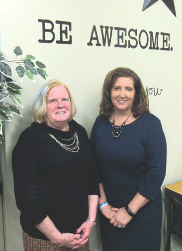 EANE President Meredith Wise, left, and Sunshine Village Executive Director Gina Kos.
