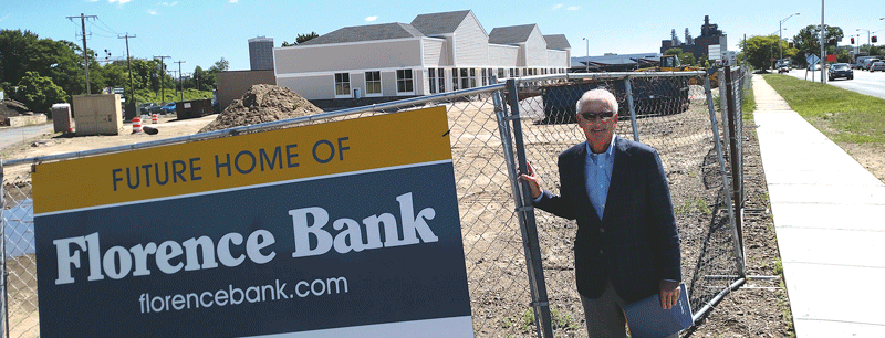 Bank President John Heaps Jr. visits the construction site.