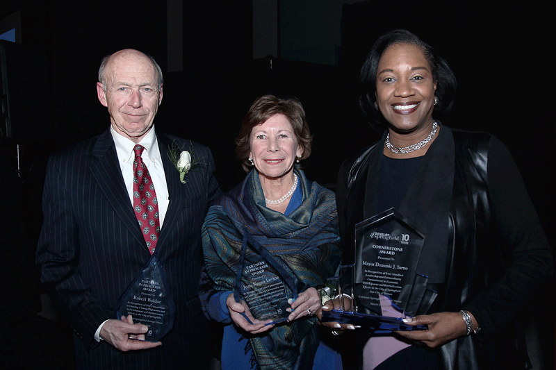 From left, Bob Bolduc, founder of Pride Stores, and Joan Kagan, president and CEO of Square One, received the Partners in Progress Award