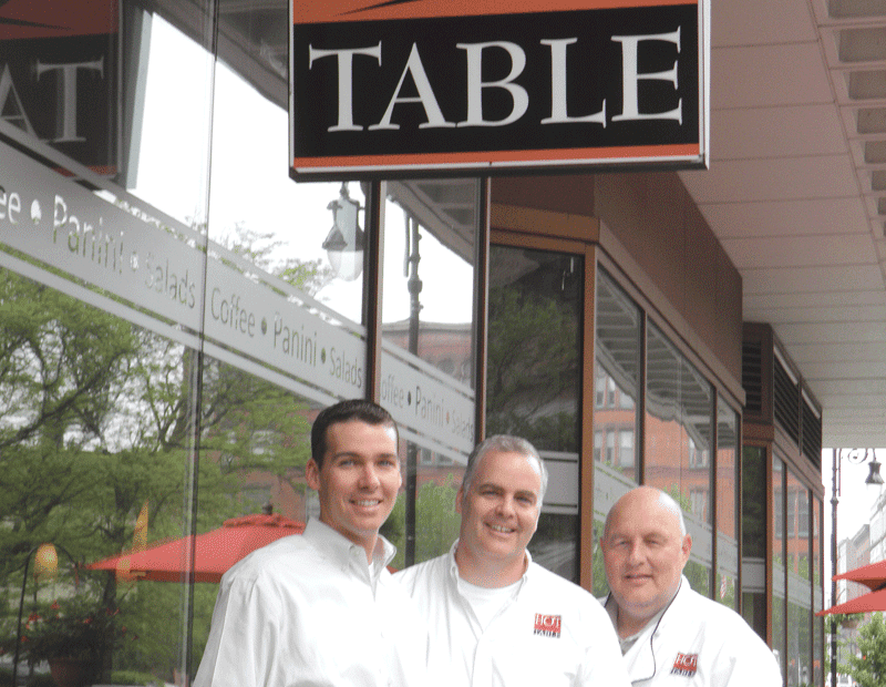 From left, Chris DeVoie, John DeVoie, and Don Watroba say Hot Table was so successful in 16 Acres that they expanded to a second, downtown location, which is also thriving.
