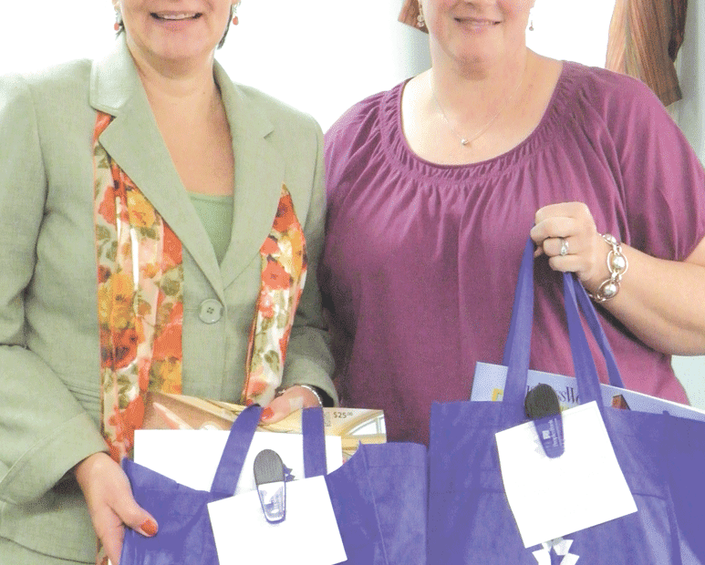 Kate Phelon (left, with Pam Bussell, administrative assistant)