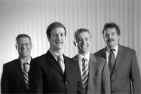 The executive team at Westfield Bank: from left, Leo Sagan, CFO; James Hagan, president and CEO; Allen Miles, executive vice president; and Gerald Ciejka, legal counsel.