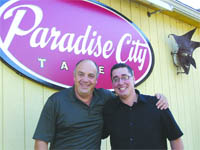 Claudio Guerra, left, with Operations Manager Bill Collins,