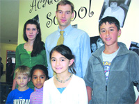 Jake Giessman, or ‘Mr. G,’ as he’s known, with several of his students at Academy Hill. He described 2008 as a breakthrough year for the facility.