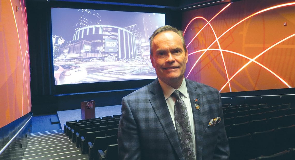 John Doleva shows off the Basketball Hall of Fame’s renovated theater, one of many improvements at the hall.