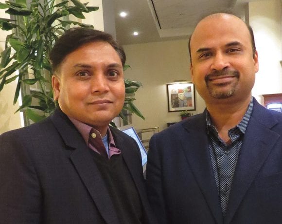 Dinesh Patel, left, and Vid Mitta in the soon-to-be-renovated lobby of the Tower Square Hotel.