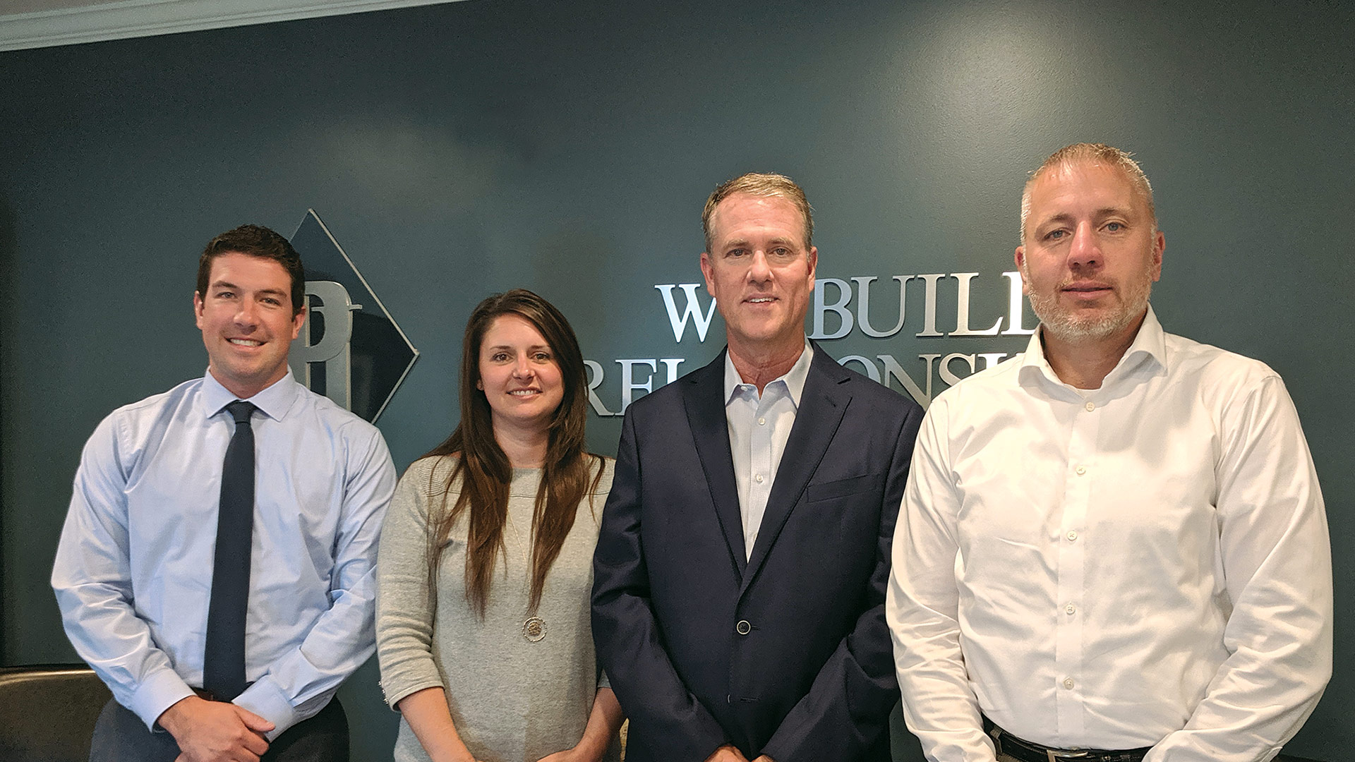 Phillips Insurance team members, from left, Christopher McMaster,  Chrystal Greenleaf, Joe Phillips, and Christopher Rivers.