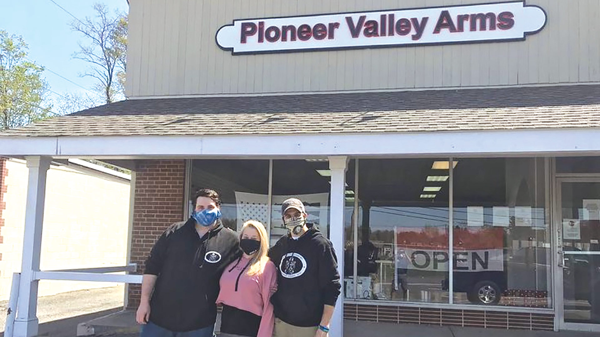 From left, Michael Meunier, owner Kendall Knapik, and Orpheus Barrows from Pioneer Valley Arms.