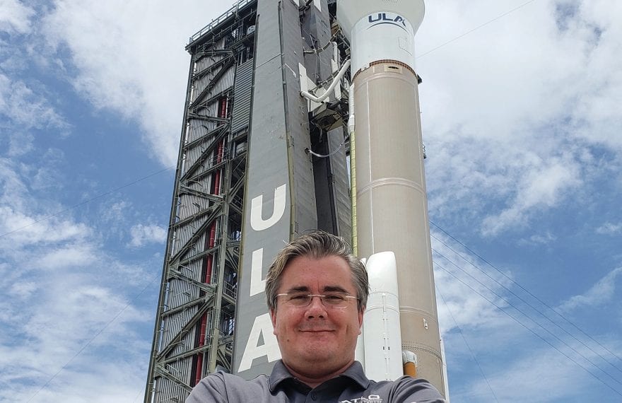 David Gruel stands next to the launchpad