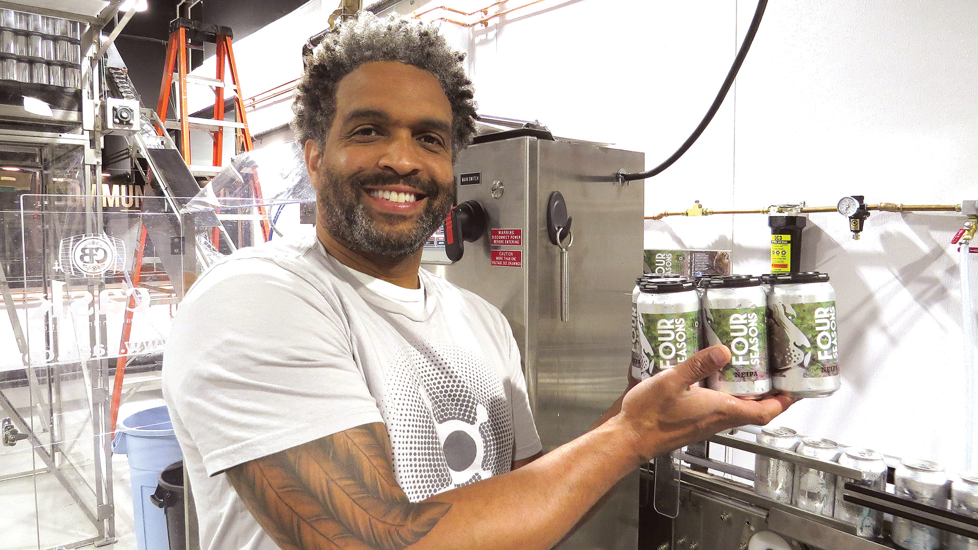Ray Berry, seen here at the canning line at White Lion’s downtown Springfield brewery