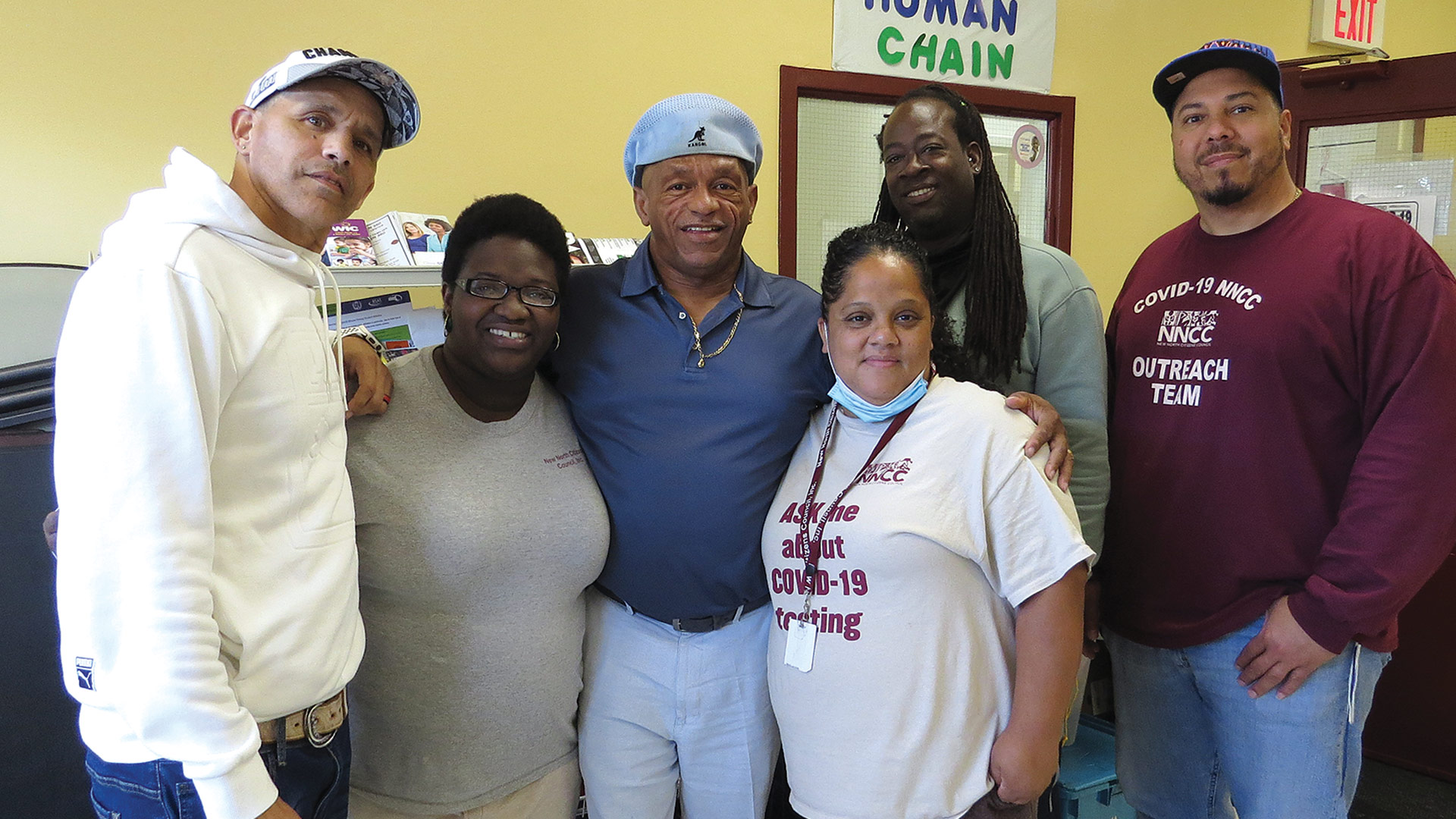 Richard Johnson, center, with many of the team members staffing the Deborah Hunt Prevention and Education Drop-in Center