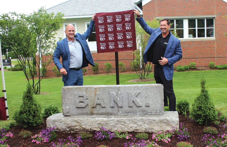 Seen with the plaque are Dan Moriarty, president and CEO of MSB, left, and Michael Rouette, executive vice president and COO.