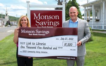 Moriarty presents Laurie Flynn, president and CEO of Link to Libraries, with a $1,500 donation as a part of the bank’s Community Giving Initiative