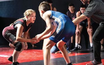 Samantha Bertini, a ninth-grade wrestler at Ludlow High School, who competes in the boys’ division even though she weighs in at 97 pounds and is a few inches shy of five feet