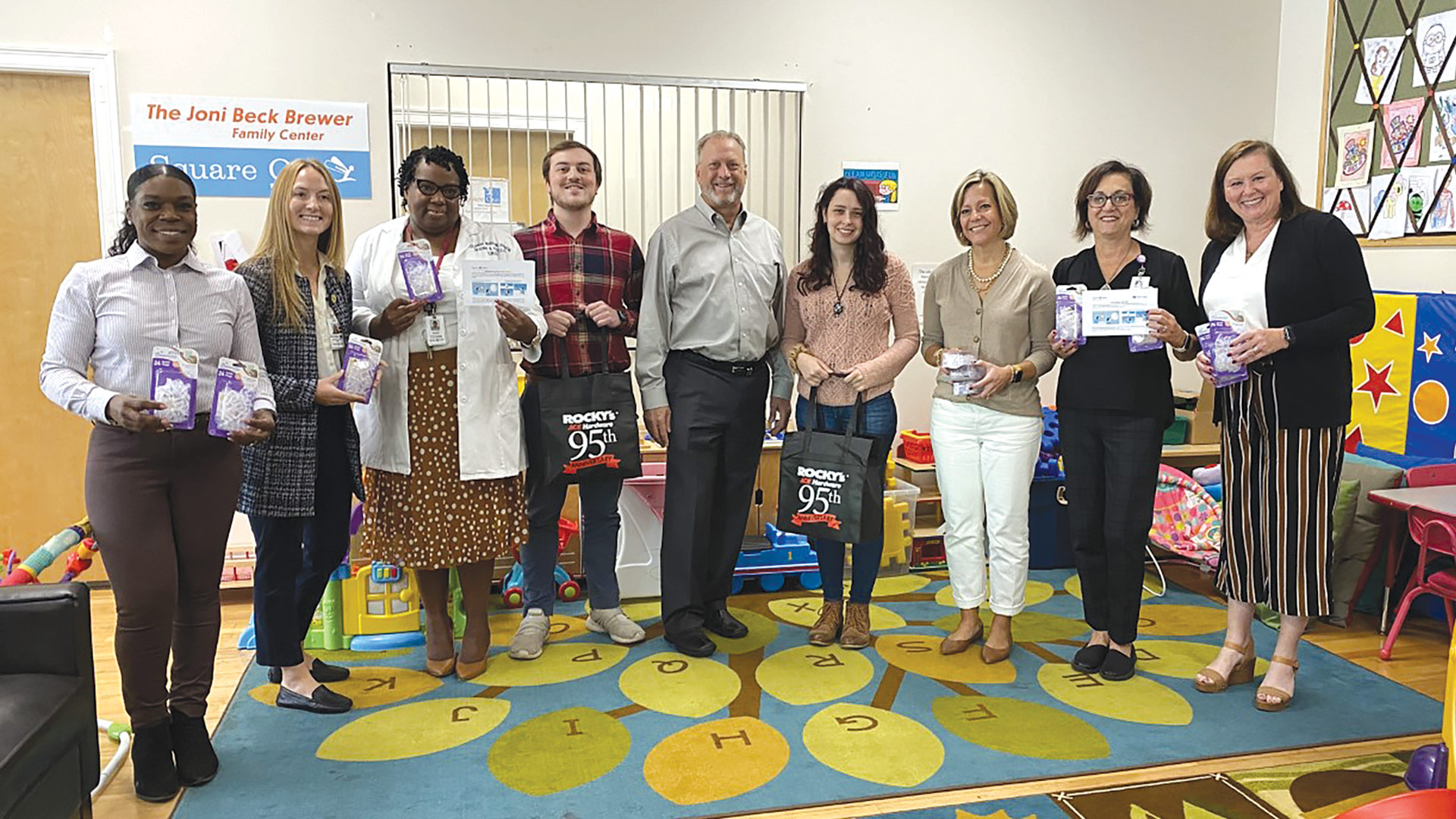 Pictured, from left: Melissa Blissett of Square One; Burdick; Yolanda Marrow of Baystate Health; Jonathan Cosenzi, Rocco Falcone, and Caitlin Petrone of Rocky’s Ace Hardware; Kristine Allard of Square One; Ida Konderwicz of Baystate Health; and Dawn DiStefano of Square One.