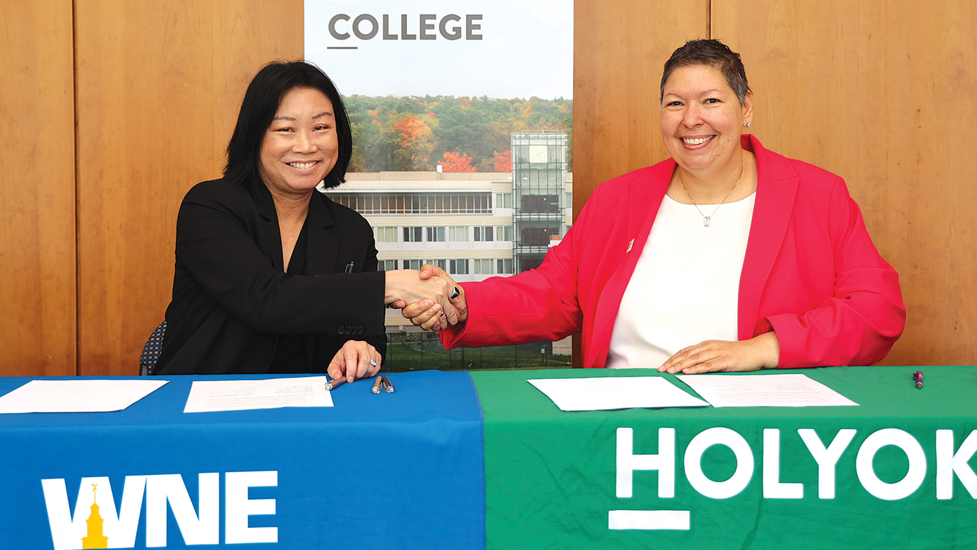 Maria Toyoda (left), provost and senior vice president of Academic Affairs Western New England University (WNE), and Holyoke Community College (HCC) President Christina Royal recently signed a joint admissions