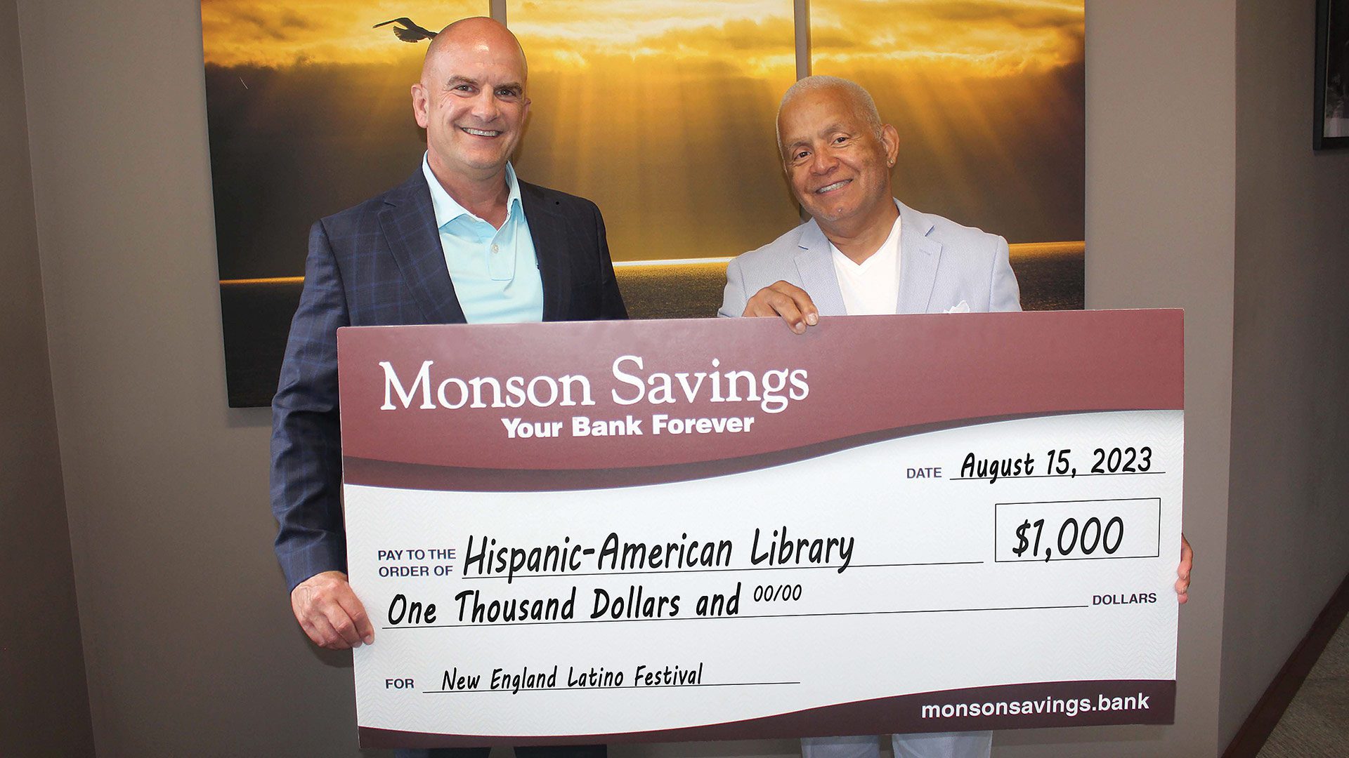 Pictured: Monson Savings Bank President and CEO Dan Moriarty (left) and Hispanic-American Library Executive Director Juan Falcon.