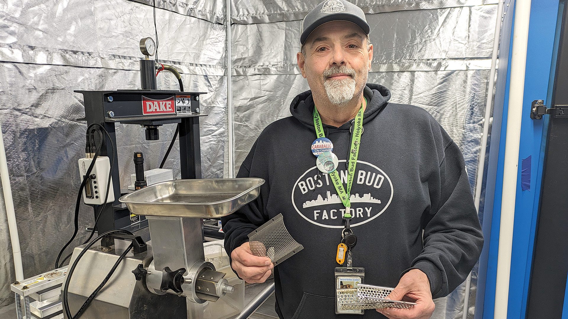 Frank Dailey shows off some equipment used to grind cannabis.