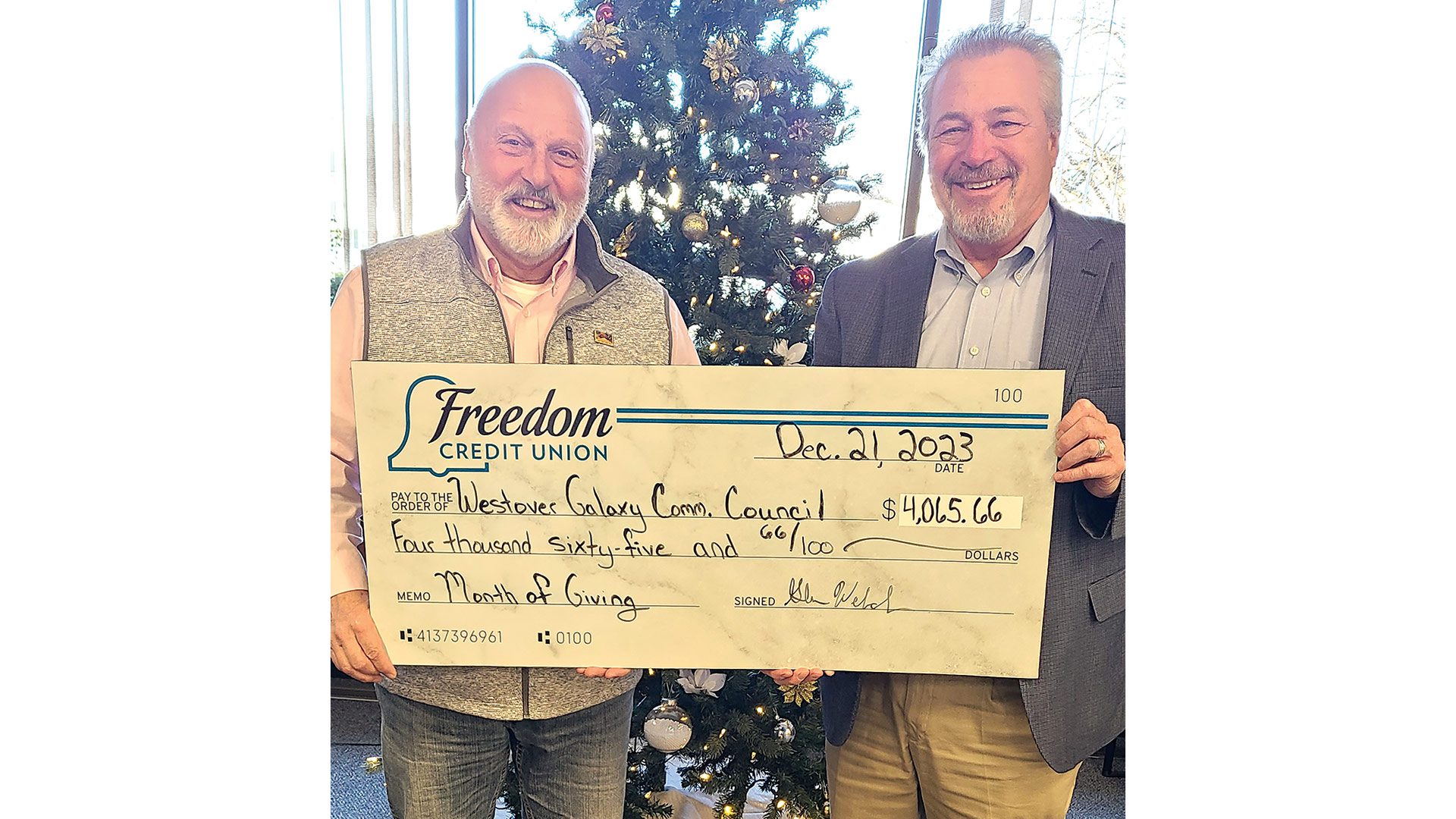 Pictured: John Beaulieu (left), president of Westover Galaxy Community Council, and Glenn Welch, President and CEO of Freedom Credit Union. (Photo by Market Mentors)