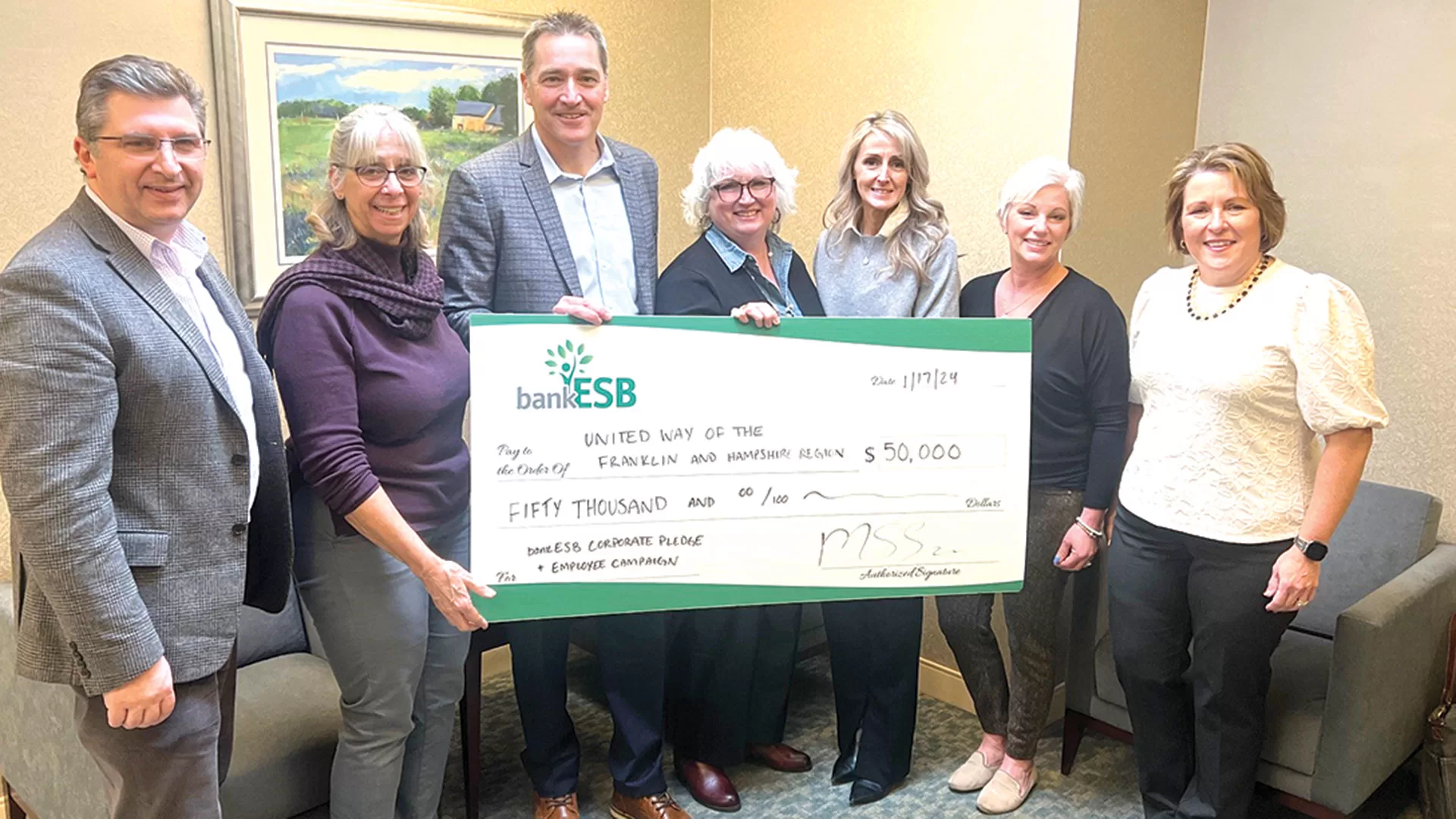 Pictured: United Way of the Franklin & Hampshire Region Director of Development Holly Martineau (center) flanked by, from left, bankESB’s Gary Turku, Marge Prendergast, President and CEO Matthew Sosik, Jessica West, Dena Hall, and Bozena Dabek.