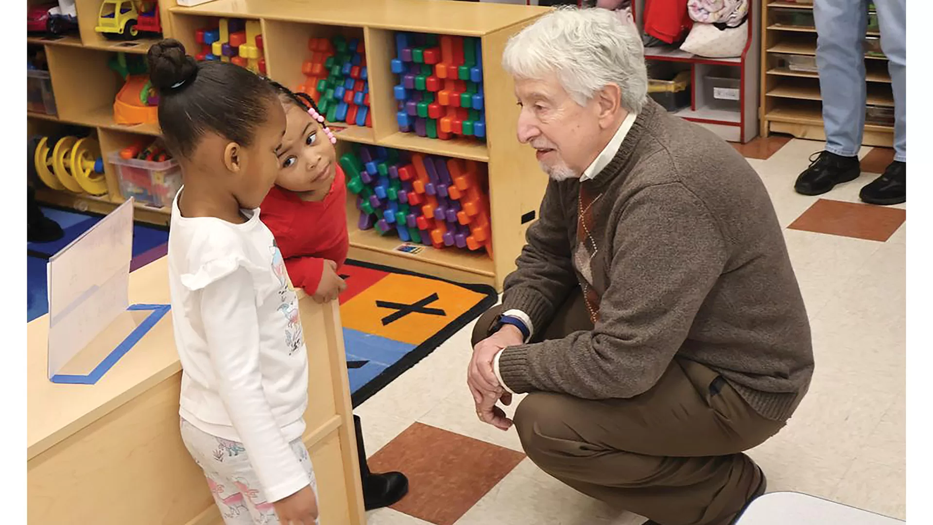 Dr. Fred Kadushin gets to know some of the young students at Square One in Springfield