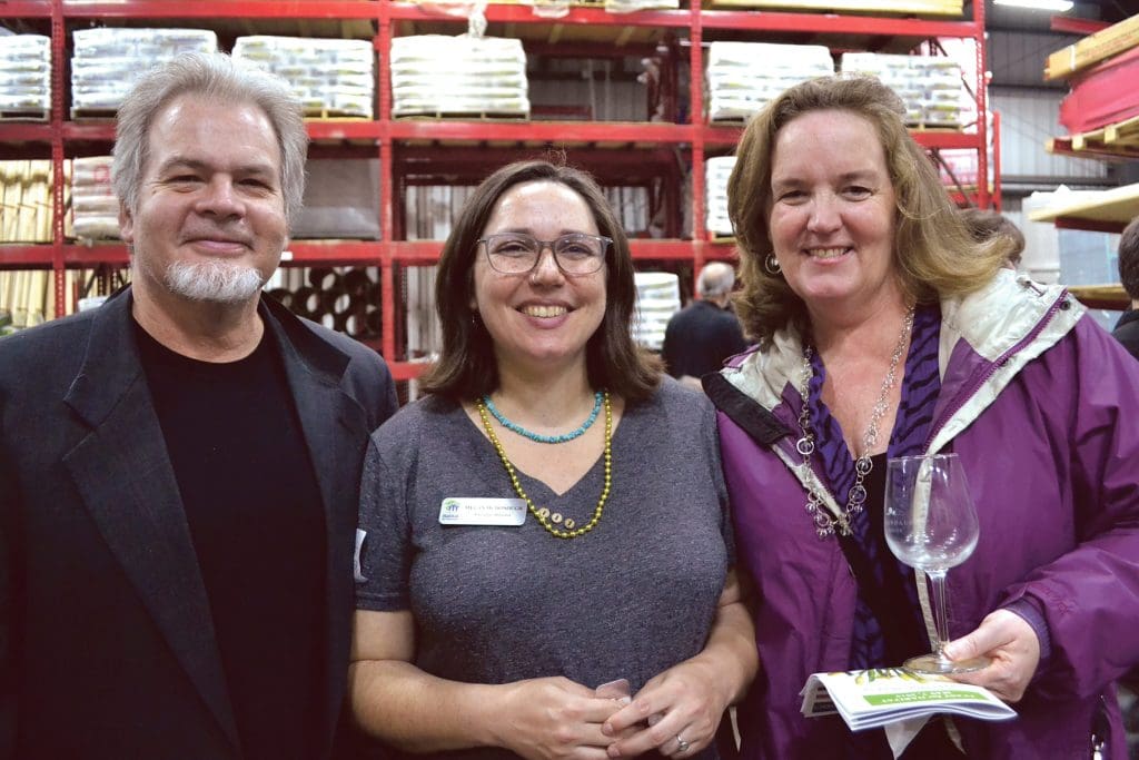 Megan McDonough (center) with Charles Roberts and Aelan Tierney of Kuhn Riddle Architects & Designers, which has provided pro bono design services for Habitat for Humanity projects.