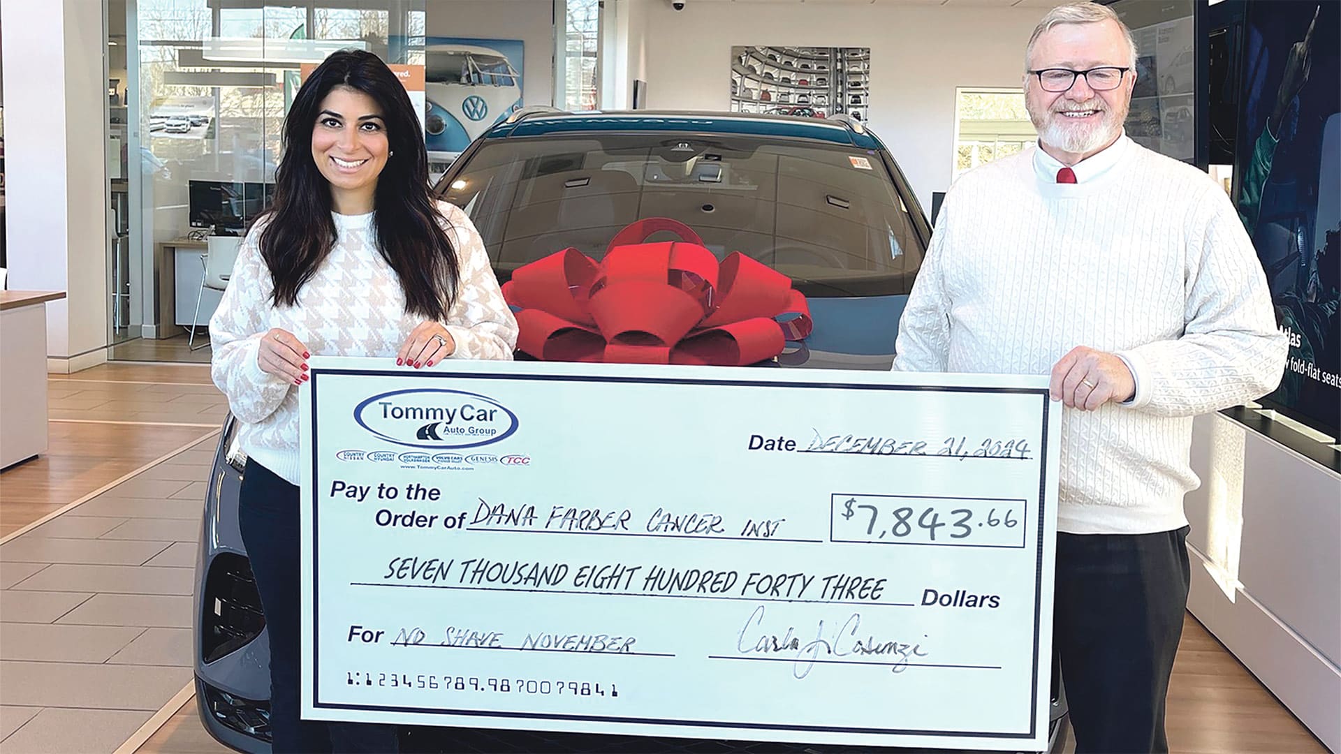 Pictured, from left: Carla Cosenzi, president of TommyCar Auto Group, and Hampshire County Sheriff Patrick Cahillane.