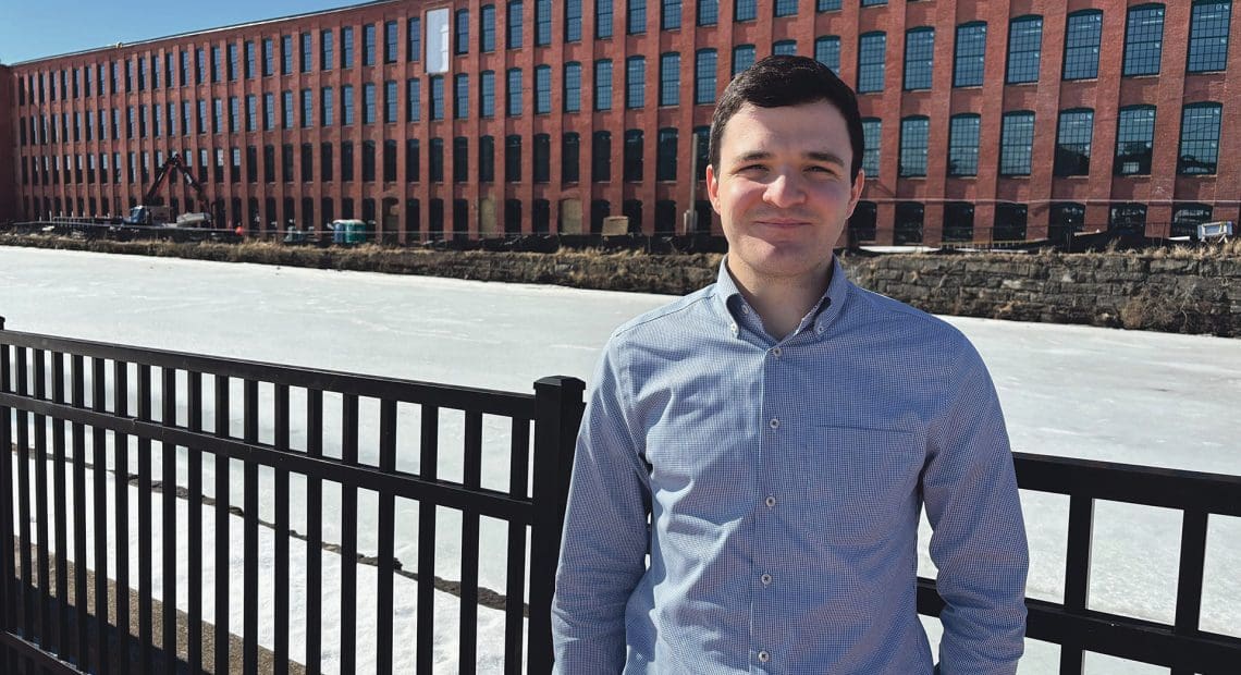Hagop Toghramadjian stands outside phase one of the Residences on Appleton, which features 88 units of mixed-income housing.