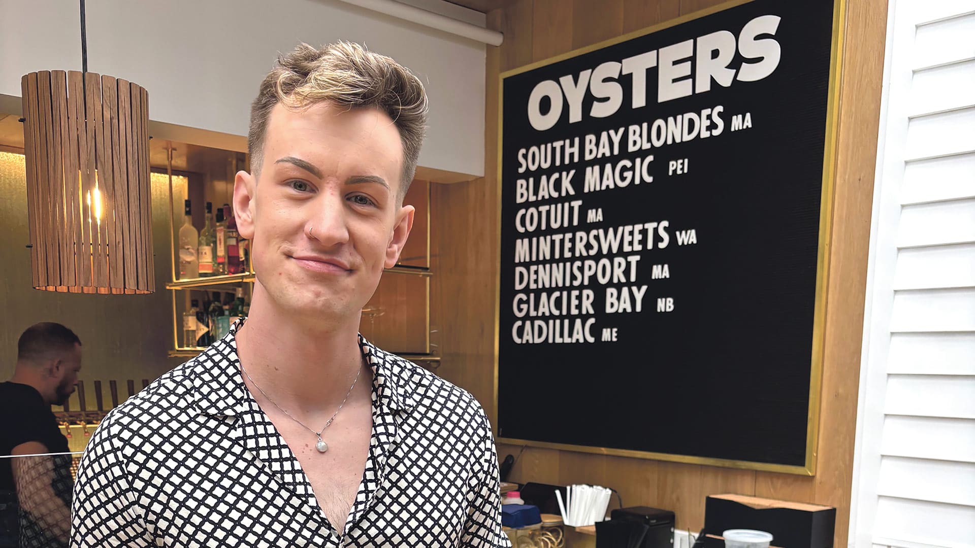 Alden Peotter shows off the recently opened Amherst Oyster Bar.