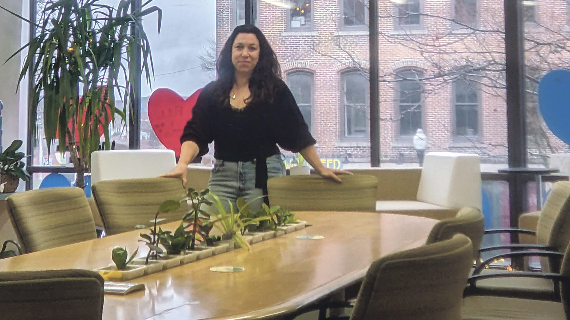 Hannah Rechtschaffen shows off the new Greenfield Business Assoc. space on Main Street.