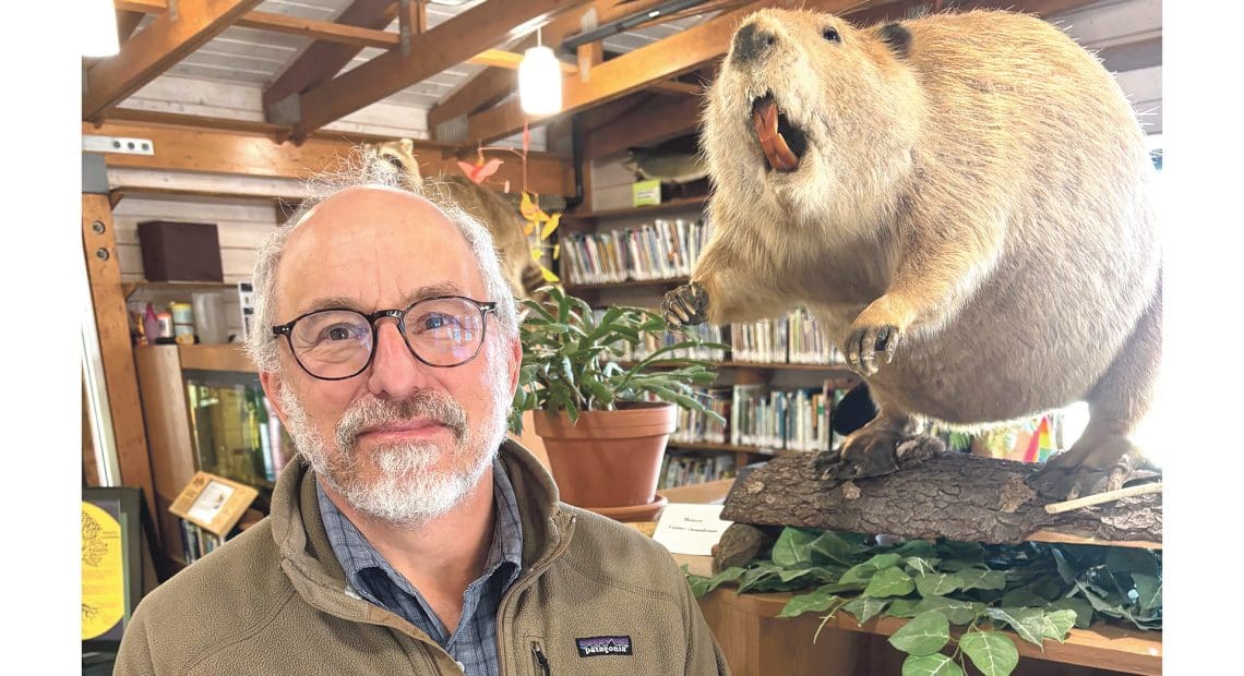 Billy Spitzer and a friend in the visitors center at the Hitchcock Center for the Environment in Amherst.