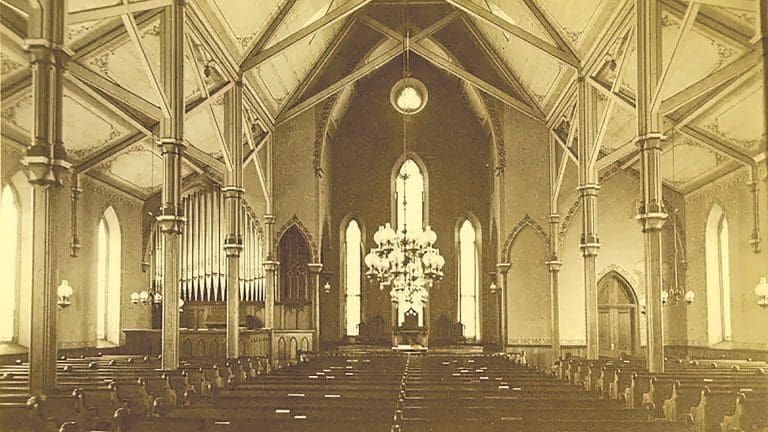 The historic chapel, seen above in an archival photo, will be restored to its former glory and given a new role as a dining facility, as seen in the architect’s rendering below.
