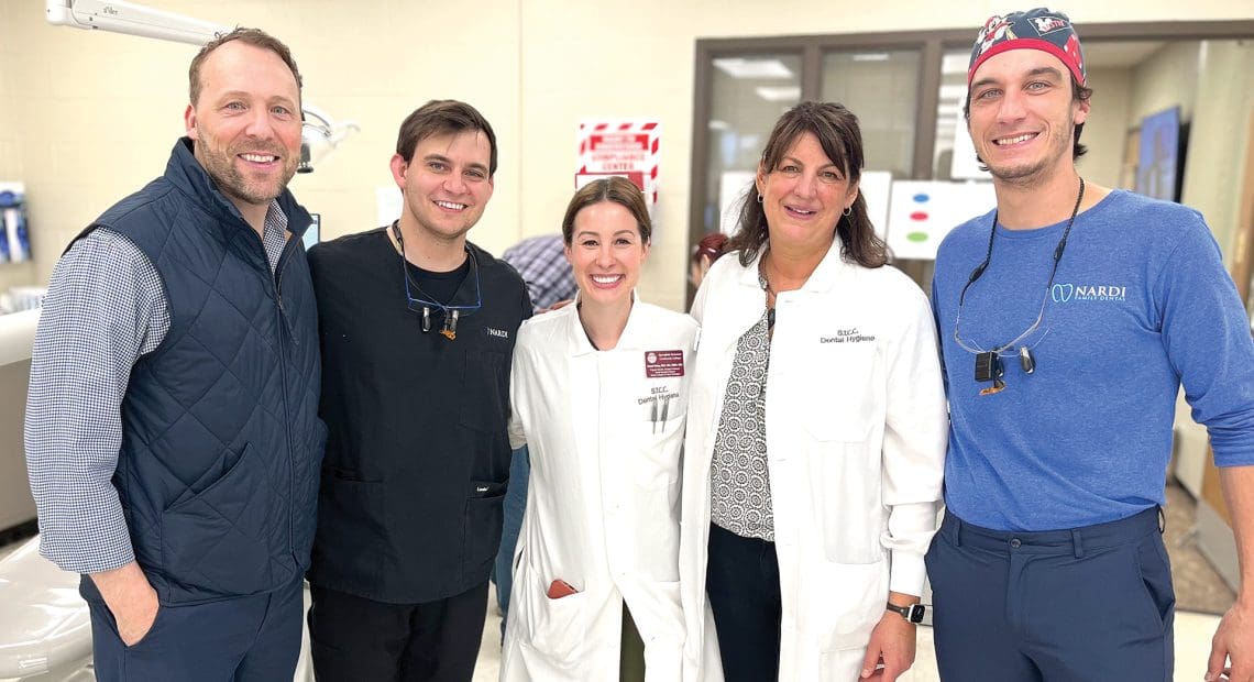 Pictured, from left: STCC President John Cook, volunteer dentist Dr. Michael Nardi, STCC faculty members Samantha Kelley and Darlene O’Brien, and volunteer dentist Dr. Paul Nardi Jr.