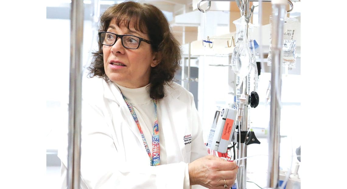 Karen Giuliano with an IV pole