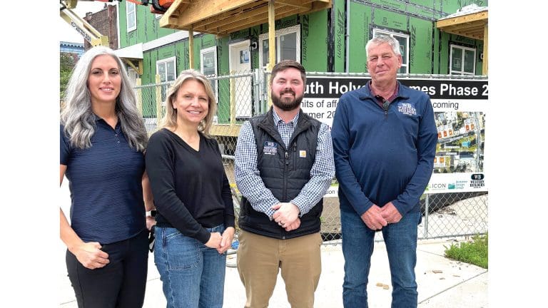 From left, Heather Roy, marketing and communications specialist; D’Lynn Healey, project executive; Bryan Hughes, president; and Ed Ackley, general superintendent.