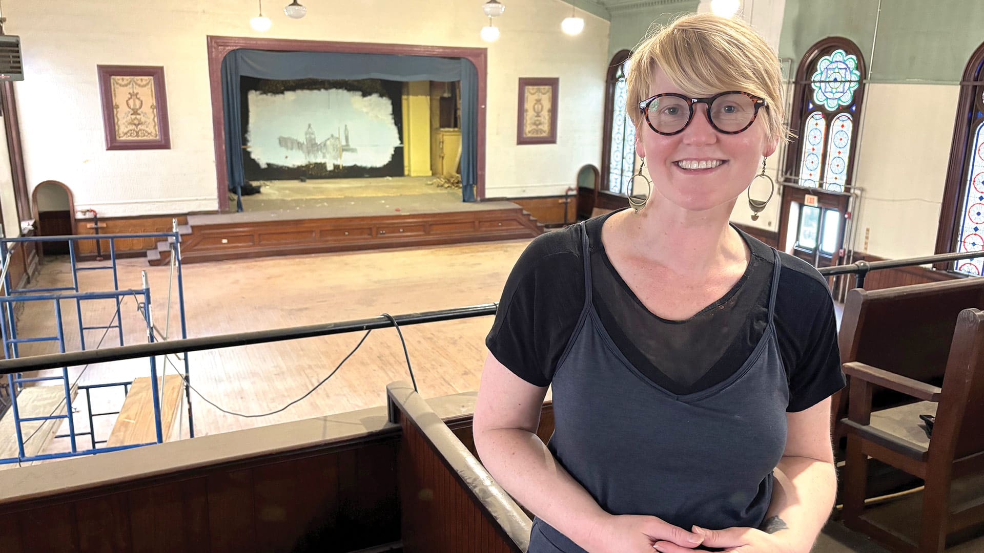 Burns Maxey in the balcony of the second-floor performance space.
