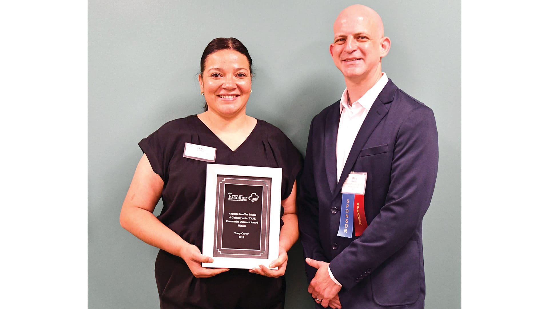 Pictured: Carter receives the award from Richard Harber, associate director of Instructional Design at the Auguste Escoffier School of Culinary Arts.