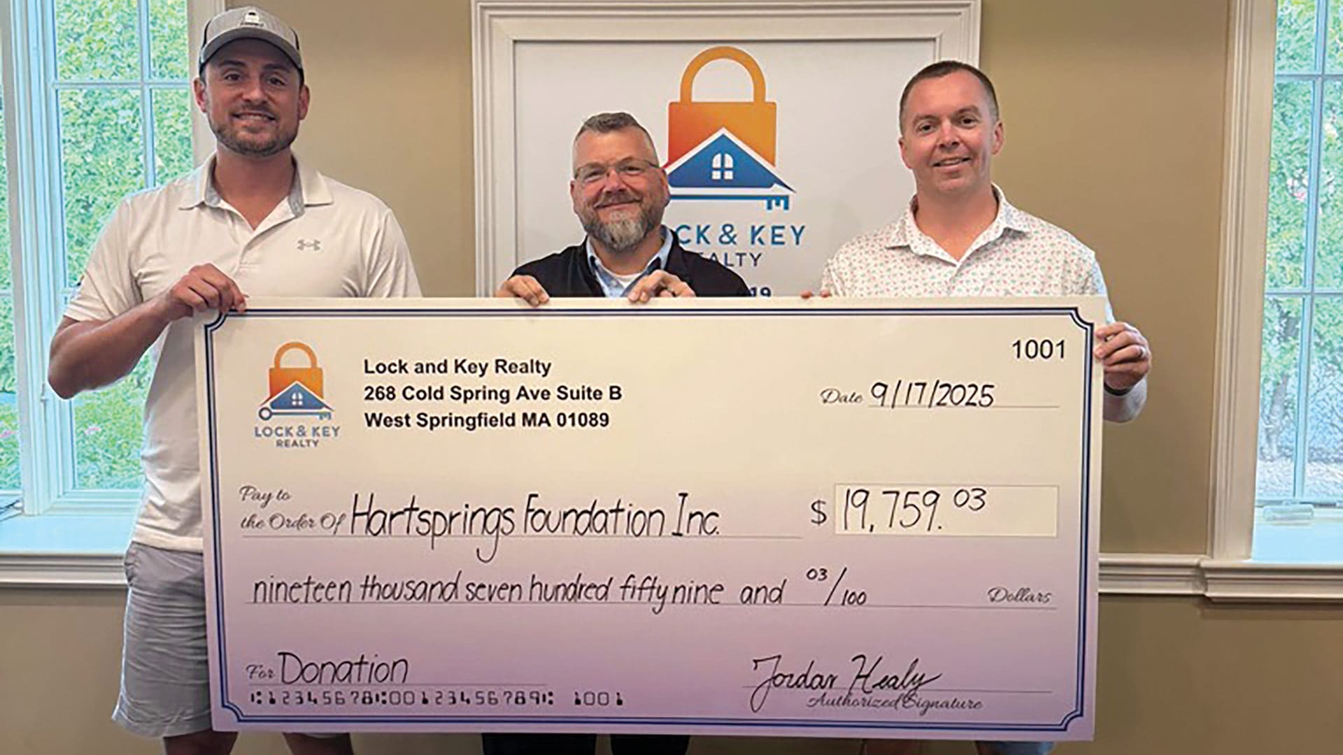 Pictured from left: Healy, David Parkinson of Hartsprings Foundation, and Murphy