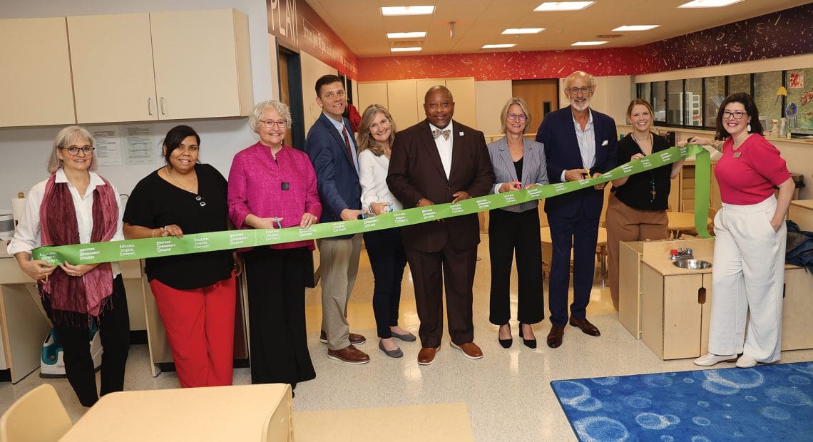 Pictured: HCC President George Timmons, state Sen. John Velis, Early Education and Care Commissioner Amy Kershaw, and others get ready to cut the ribbon.