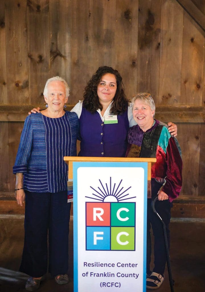 Amanda Sanderson, center, with Joan Featherman, left, one of the founders of the Resilience Center of Franklin County, and Pam Brown, a long-time director, as the agency recently celebrated its 50th anniversary.