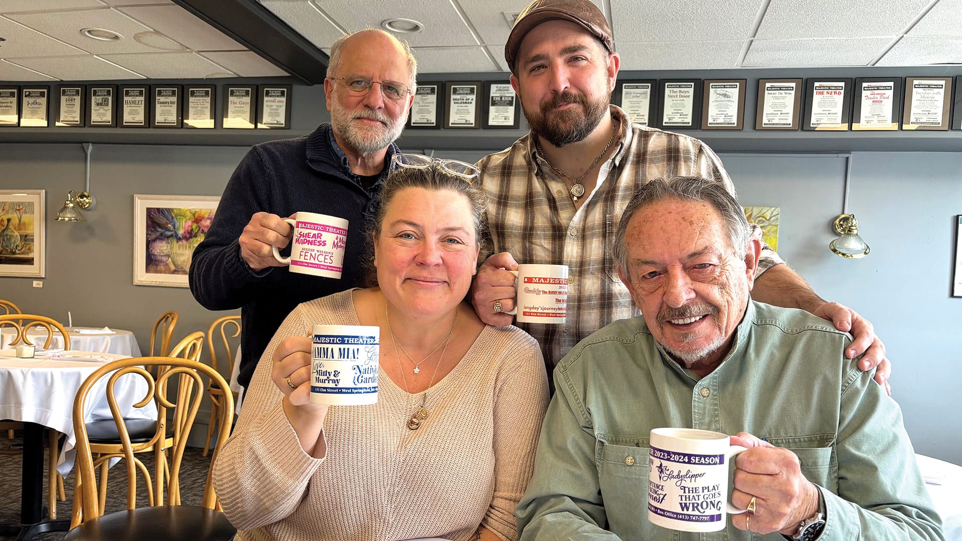 From left: Todd Kadis, Sue Dziura, Tery LaCasse, and Danny Eaton in a ‘mug’ shot.