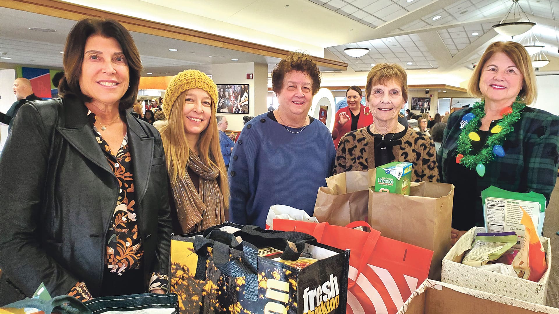 Pictured: Bay Path President Sandra Doran (far right) with, from left, Rachel’s Table’s Laura Katz, board treasurer; Chana Laila, office manager and Development assistant; Ellen Gold, immediate past board president; and Judy Yaffe, board president.