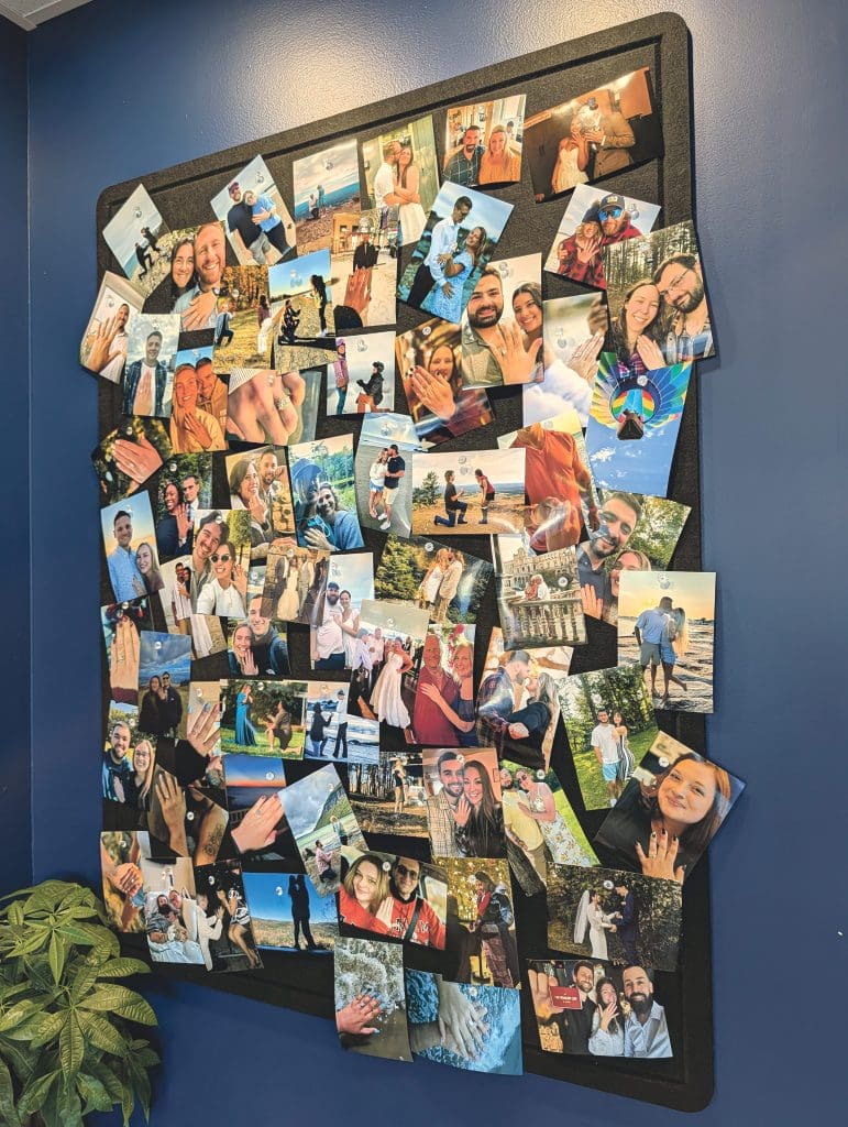Aurora Jewelers has a wall of engagement photos featuring rings purchased there.