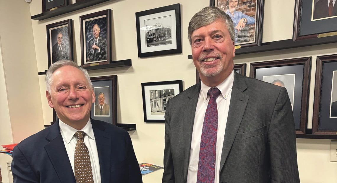 Peter Albero, left, takes the reins from Tom Meshako on April 1.