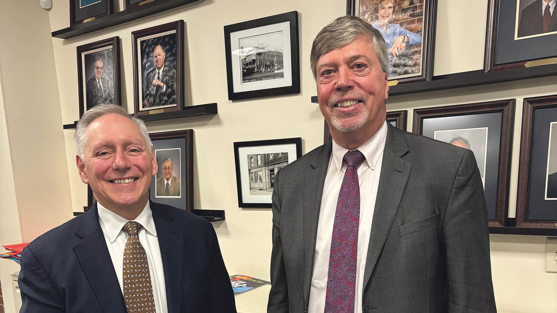 Peter Albero, left, takes the reins from Tom Meshako on April 1.