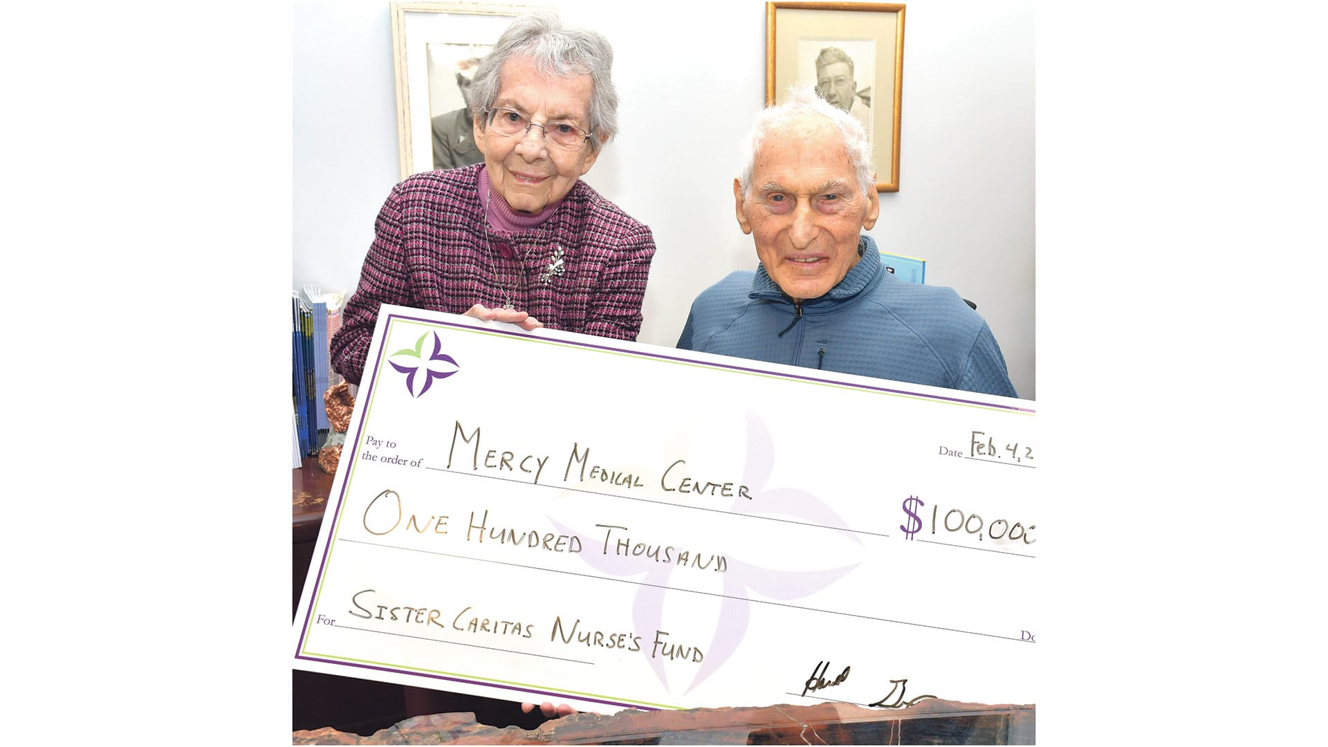 Pictured: Sister Mary Caritas, former president of Mercy Medical Center and the Sisters of Providence, with philanthropist Harold Grinspoon.