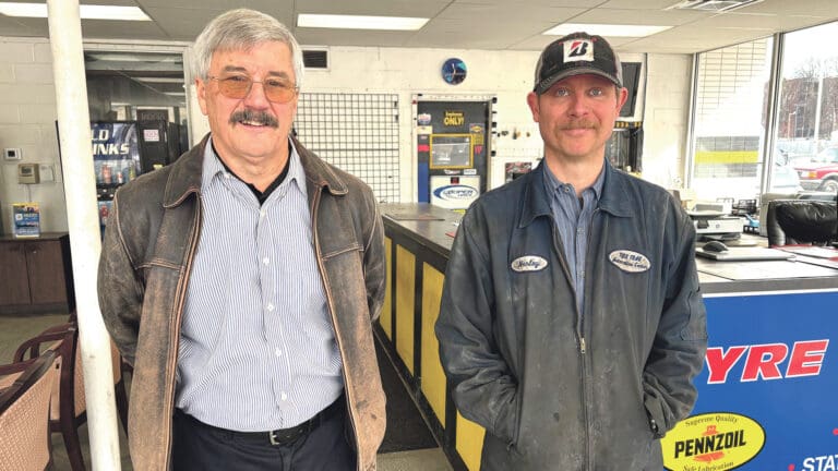 Peter Kearing, left, and Harley Andrew in the new home of Springfield Tyre Track and Auto Service.