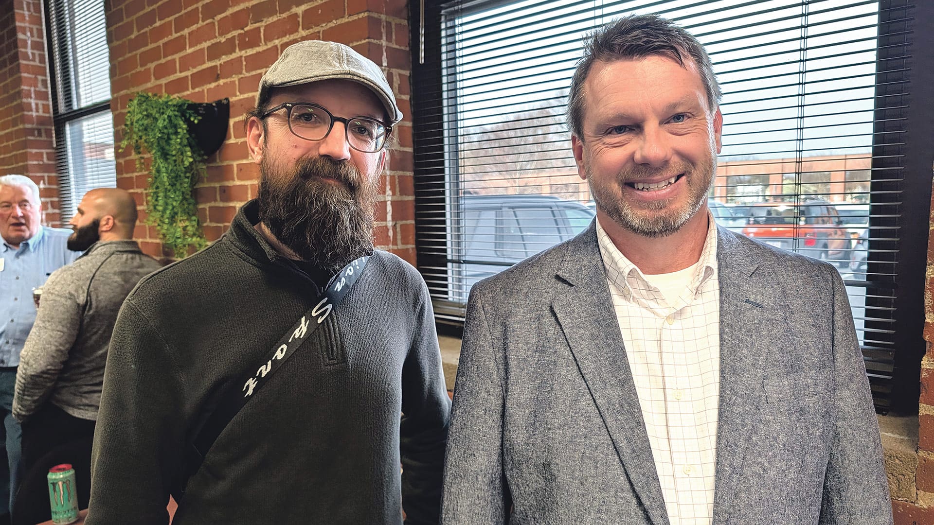 Fletcher Conlon (left), 3D modeler and concept artist, and Greg Dumas, senior project manager, of RP Masiello, one of the event sponsors.